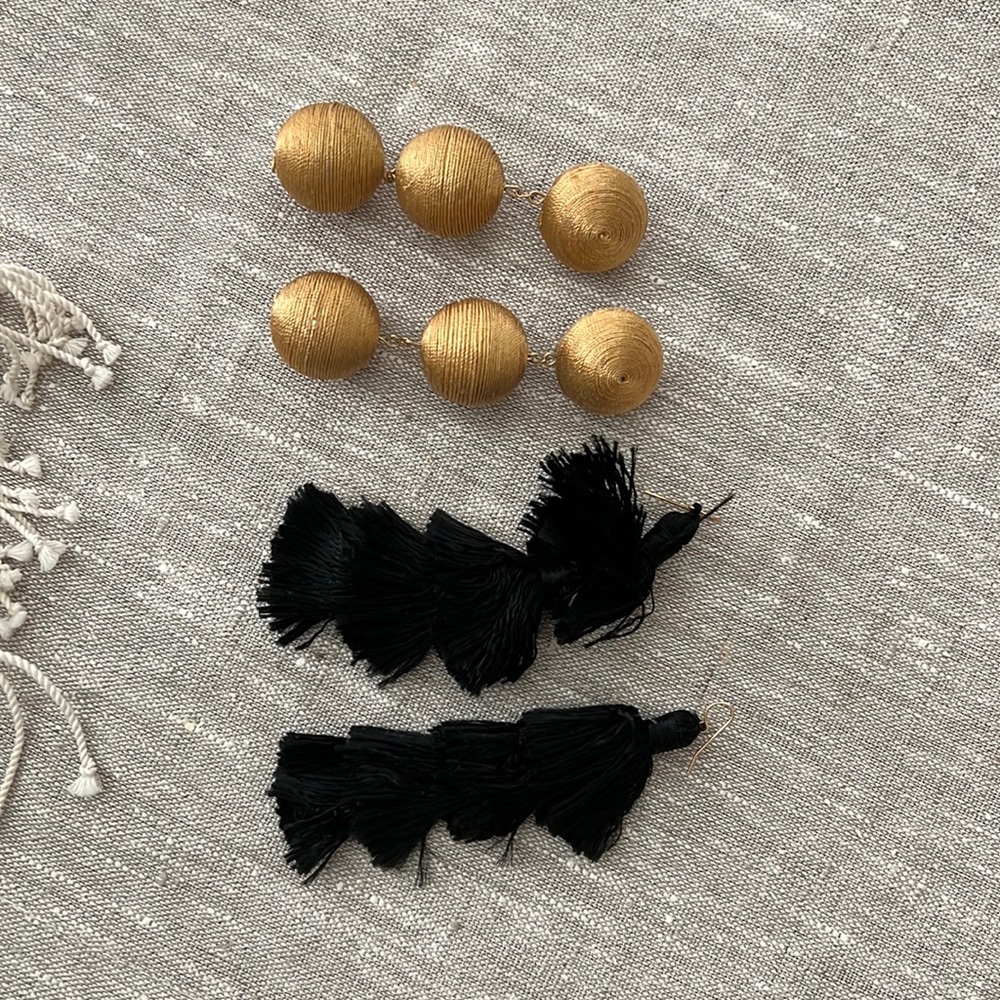 Bon Bon gold thread earrings and black silk tassel earrings.